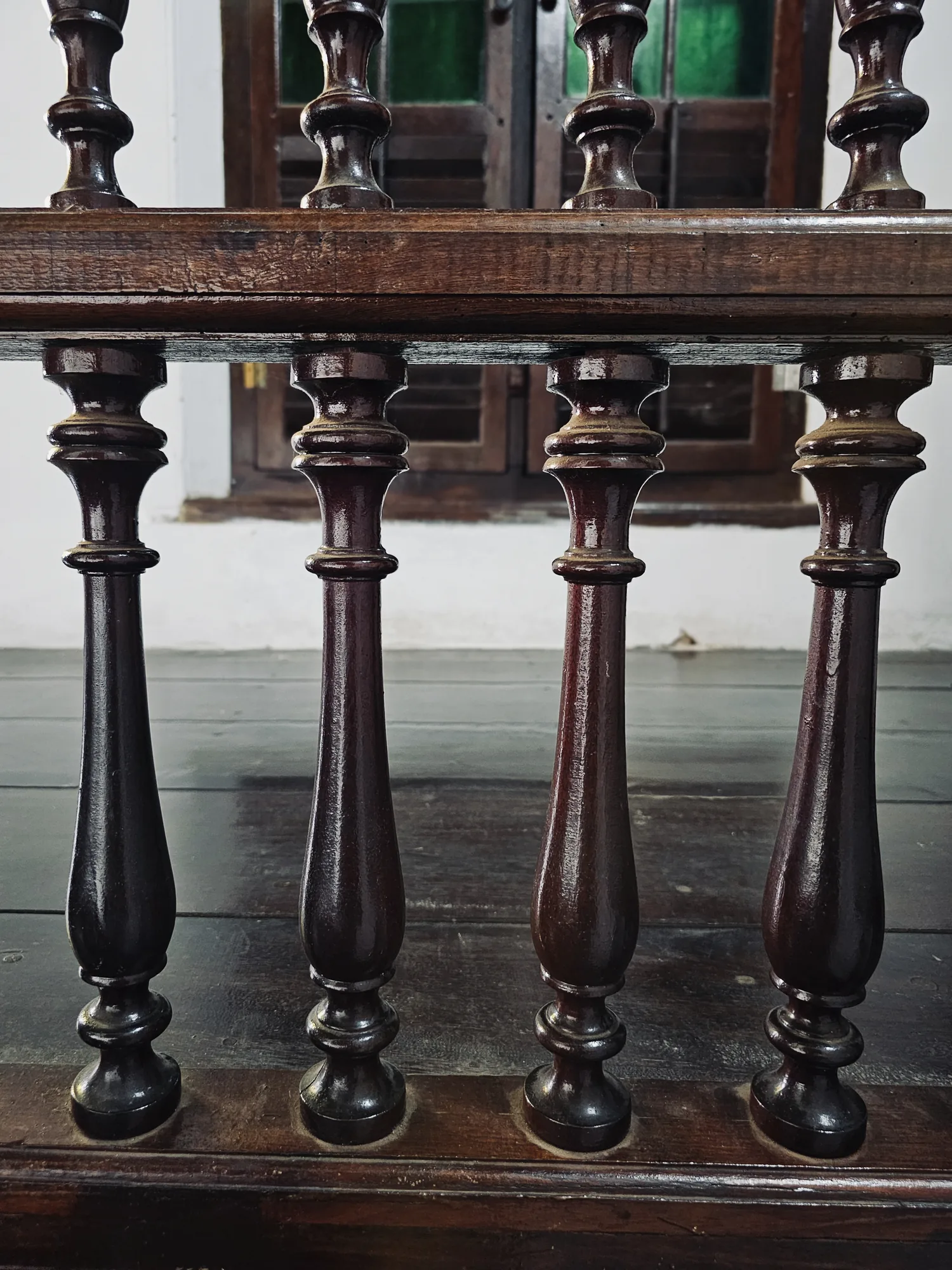Turned wooden balusters in a railing